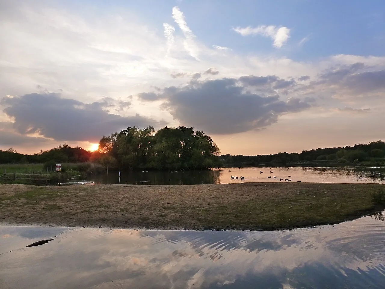 Autumn on Fleet Pond, the largest freshwater body in Hampshire and a Site of Special Scientific Interest